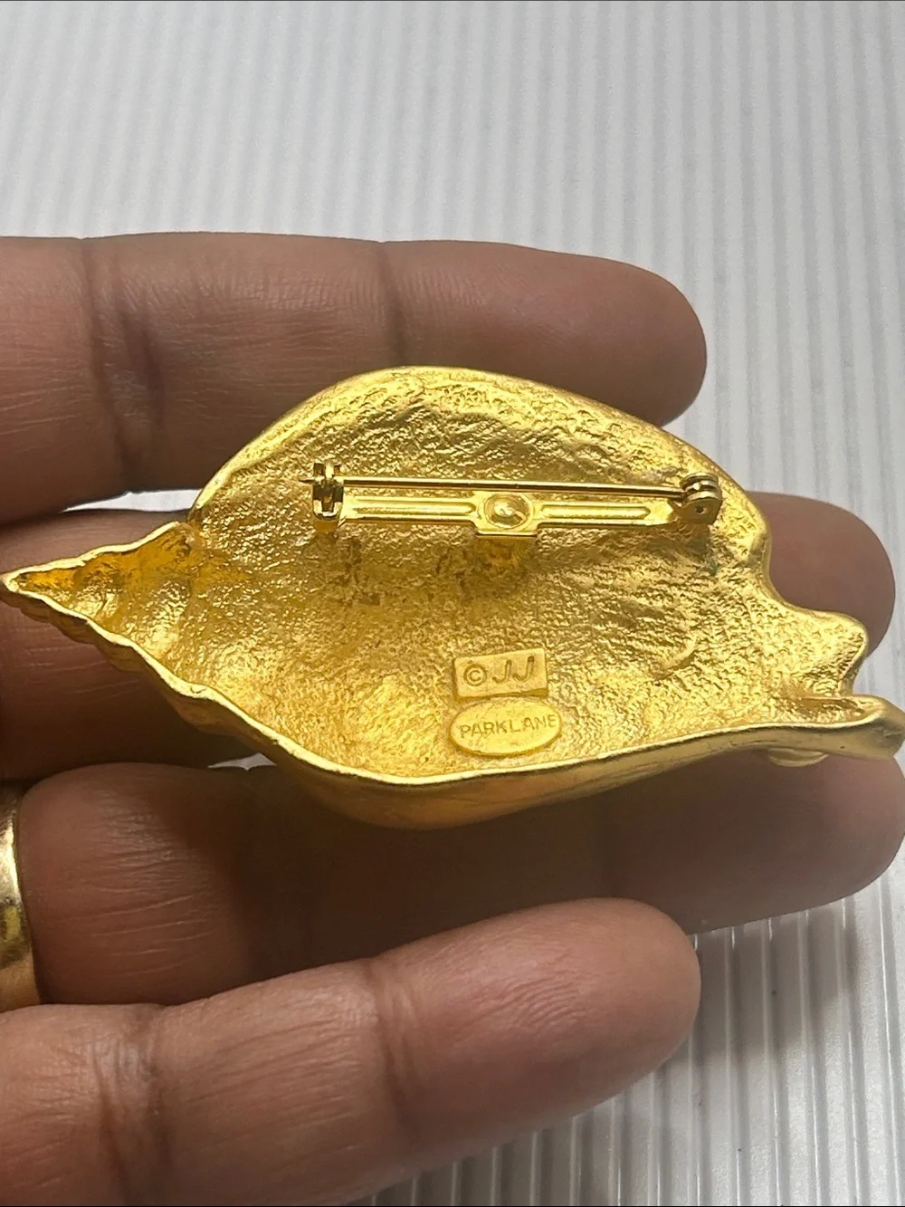 Vintage JJ Park Lane Gold-tone Shell Brooch with Multicolor Cabochons